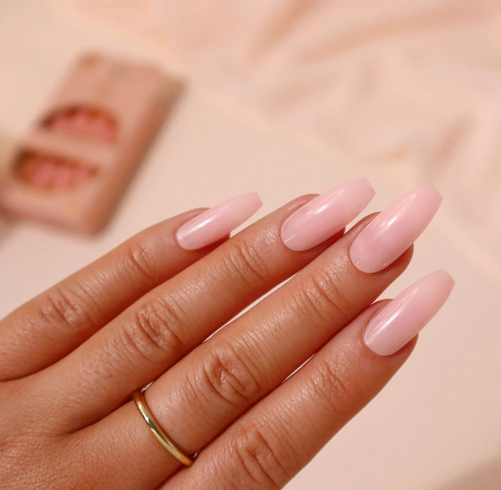 Acrylic Nail Designs for Every Skin Tone: Light, Medium, Tan & Dark 6 Rose nude coffin shaped acrylic nails