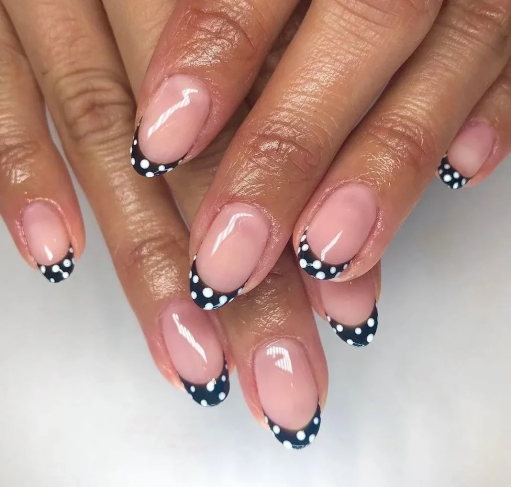 30+ Polka Dot Nail Designs That Are Stealing the Spotlight in 2025 13 Short nails with black and white polka dot French tips