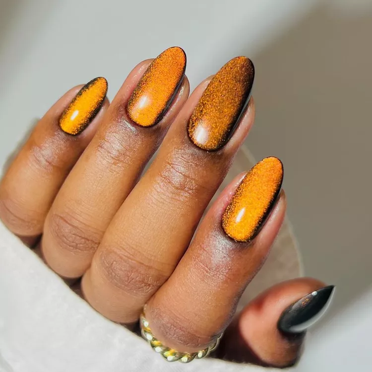 velvet texture Halloween nails in orange and black