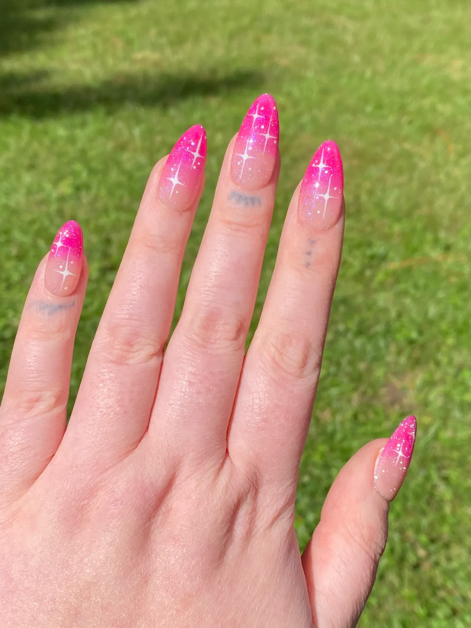 50+ Cute Pink Nail Ideas You’ll Want to Try in 2025 (Trendy, Girly & Pinterest-Perfect) 14 Sparkly hot pink gradient almond nails with glitter