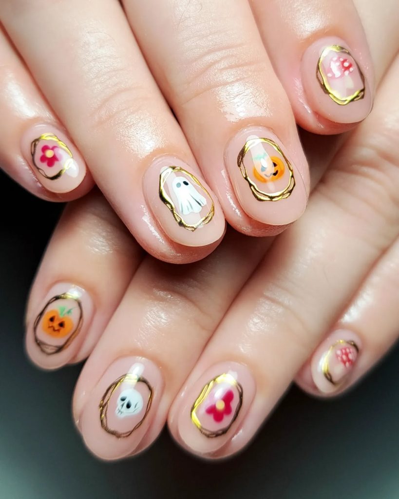 framed ghost pumpkin Halloween nails — vintage cute halloween nail art 2026