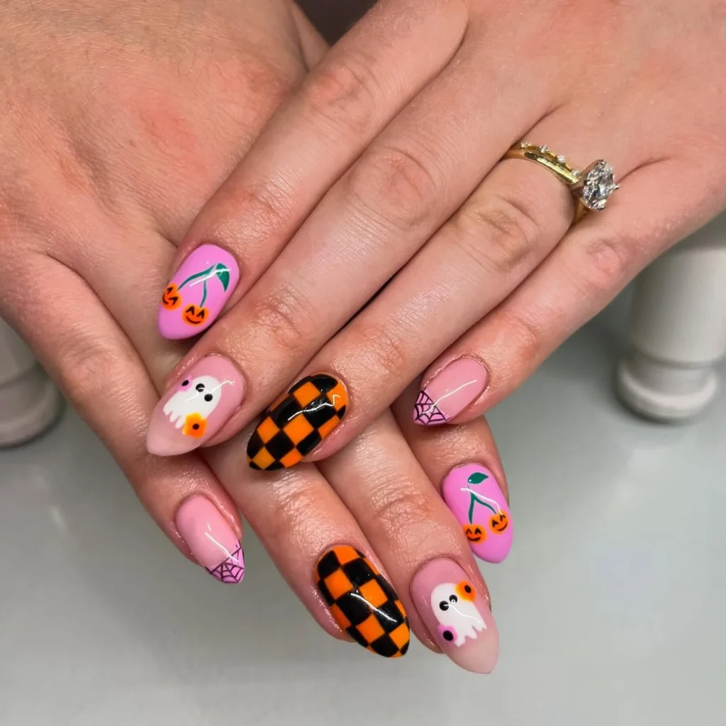 cute pink checkered ghost Halloween nails — modern halloween nail design 2026
