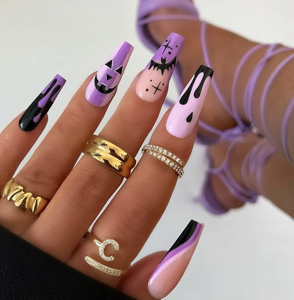 lavender glam Halloween nails purple pink black crystals — glam halloween nail art 2026