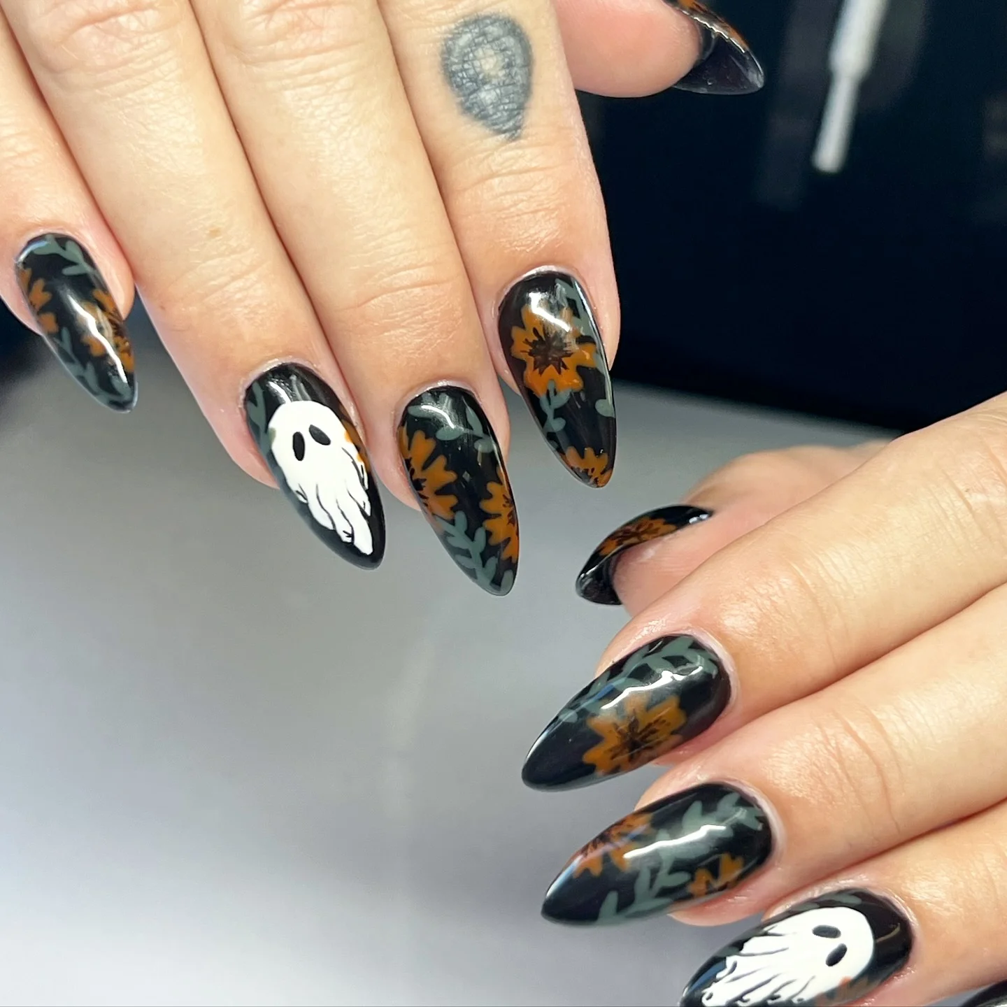 ghost floral Halloween nails black almond — chic spooky halloween nail design
