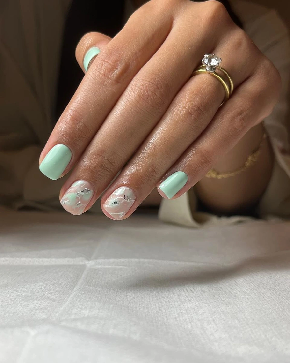 mint marble short acrylic nails