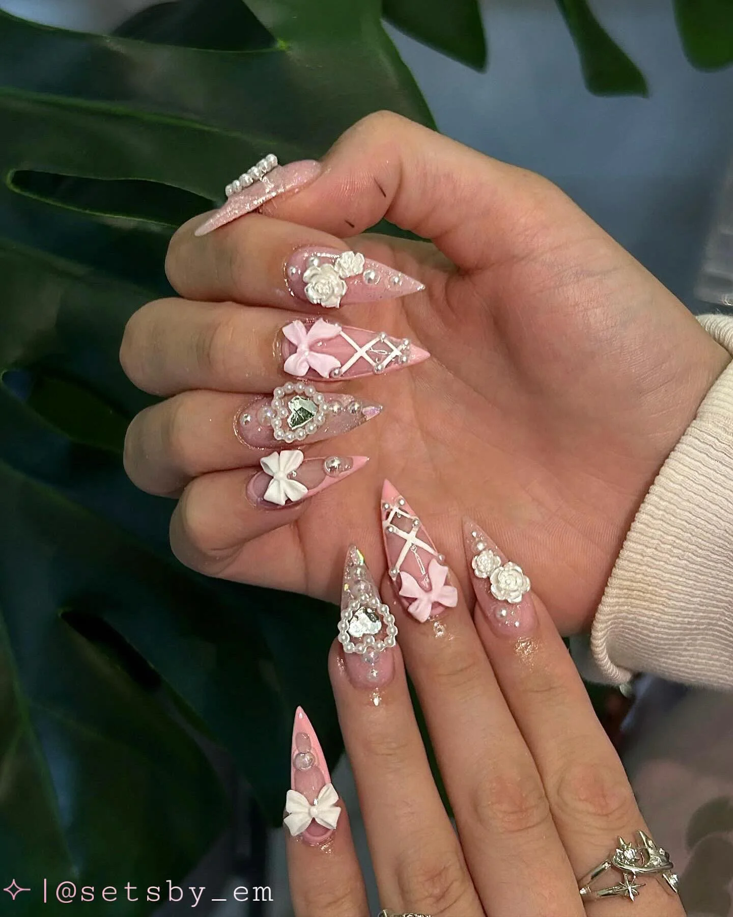 31 Nail Charm Ideas That Will Instantly Upgrade Your Nails in 2025 16 Pink 3D bow and flower nail charms with pearls