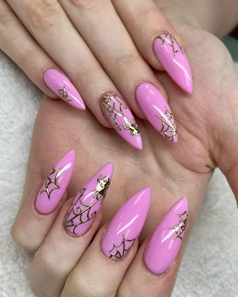 pink stiletto spiderweb Halloween nails long — dramatic halloween nail design 2026