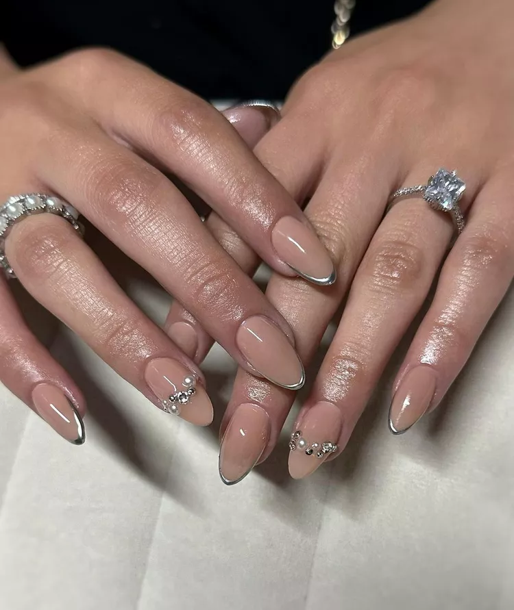 Minimal beige manicure with metallic tips