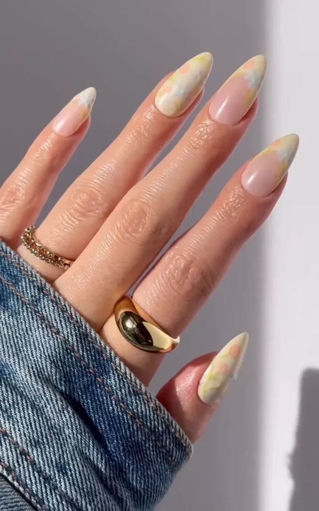 20 Beautiful Butter Yellow Nails Design You’ll Love This Summer 11 Long stiletto pastel yellow and orange watercolor bloom nail art