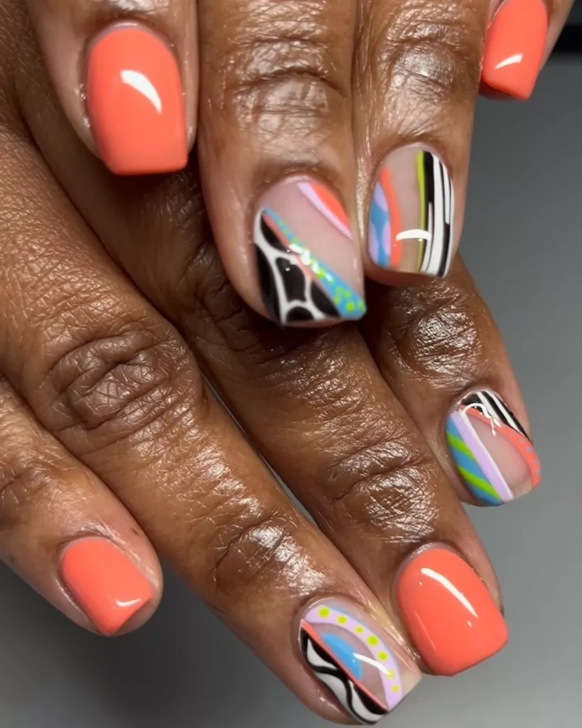 29 Simple Square Nail Designs for a Chic Summer Look (2025 Edition) 14 Mix and match abstract nail art with neon orange polish, stripes, and black cow print