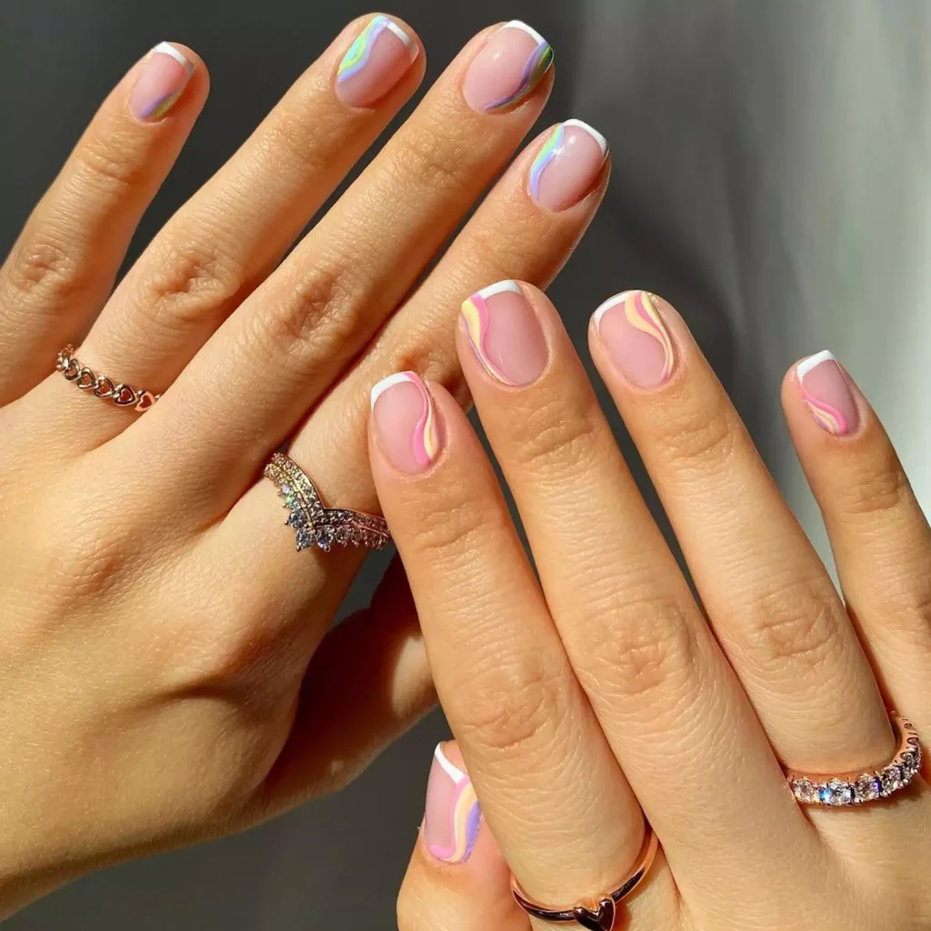 29 Simple Square Nail Designs for a Chic Summer Look (2025 Edition) 4 Short natural French manicure with pastel squiggle art over a sheer nude base