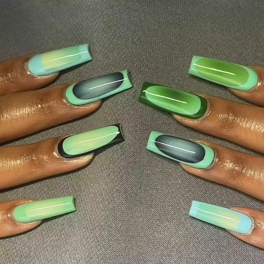 29 Simple Square Nail Designs for a Chic Summer Look (2025 Edition) 15 Green and teal jade aura nails on long coffin shape with a dark green border nail art