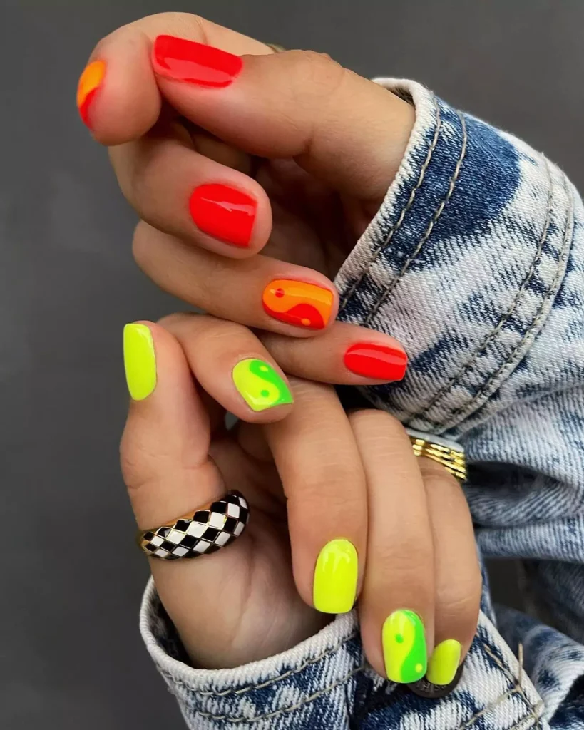 29 Simple Square Nail Designs for a Chic Summer Look (2025 Edition) 6 Mix and match neon nails with solid red and yellow-green Yin Yang nail art on short square nails