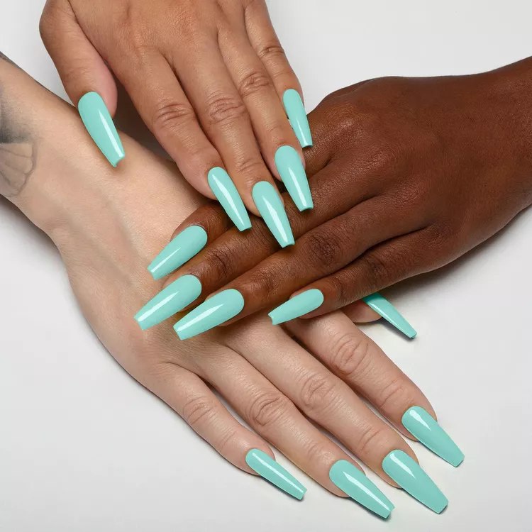 32+ Best Nail Colors for Dark Skin That Look Absolutely Stunning 26 Two hands with contrasting skin tones (fair and dark) displaying extra-long, high-gloss coffin nails painted in a classic Tiffany blue/mint green shade.