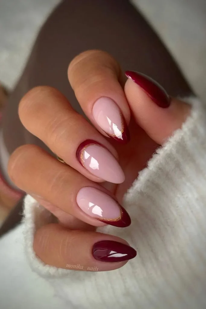 41+ Stunning Almond Christmas Nail Designs to Slay the Holiday Season 19 Deep burgundy red inverted French tips with gold line accent, a chic and edgy winter holiday design.,.