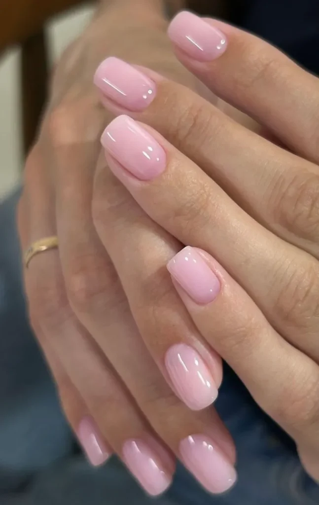 15 Short Nail Ideas for Women Over 60 Elegant, Easy-to-Maintain Designs That Flatter Mature Hands (2026) 3 soft square sheer pink short nails over 60 — feminine elegant mature manicure