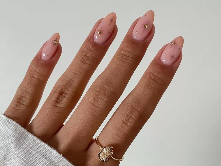 25 Back to School Nail Ideas 2026 Cute, Classy & School-Appropriate Designs for Students & Teachers 11 blush pink gold stars back to school nails 2026 — celebratory school manicure