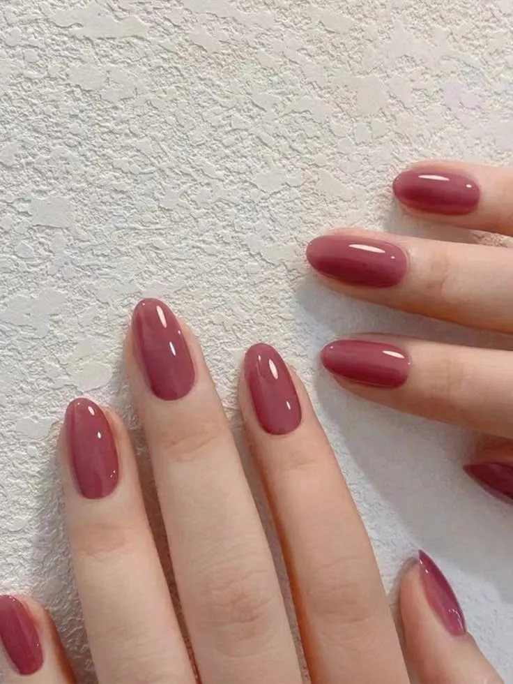 15 Short Nail Ideas for Women Over 60 Elegant, Easy-to-Maintain Designs That Flatter Mature Hands (2026) 8 soft mauve oval short nails over 60 — sophisticated elegant mature manicure
