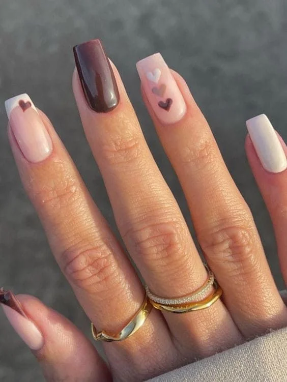 30 Chocolate Brown Nail Designs 2026 Rich, Cozy & Completely Irresistible — The Trendiest Color of the Year 25 chocolate brown heart accent nails 2026 — romantic cozy sweet manicure