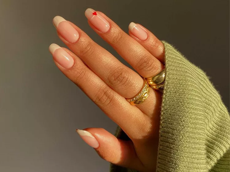 25 Back to School Nail Ideas 2026 Cute, Classy & School-Appropriate Designs for Students & Teachers 18 subtle heartaccent teacher nails 2026 — elementary school educator manicure