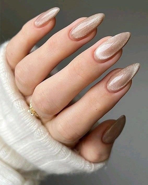 champagne shimmer nail colors for women over 50 — rose gold metallic elegant manicure