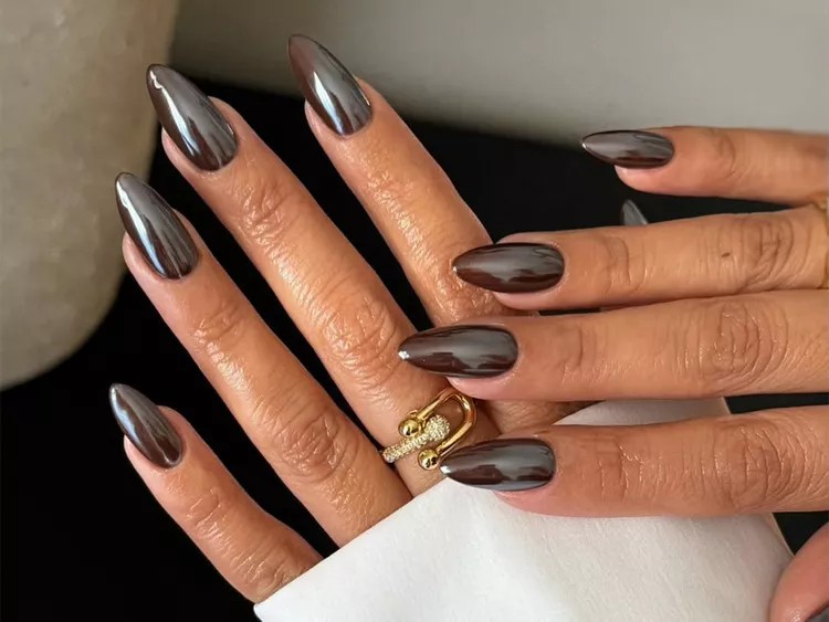 30 Chocolate Brown Nail Designs 2026 Rich, Cozy & Completely Irresistible — The Trendiest Color of the Year 17 brown chrome almond nails 2026 — mirror metallic luxurious manicure