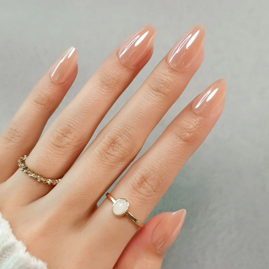 25 Back to School Nail Ideas 2026 Cute, Classy & School-Appropriate Designs for Students & Teachers 2 glazed nude almond back to school nails 2026 — clean elegant school manicure