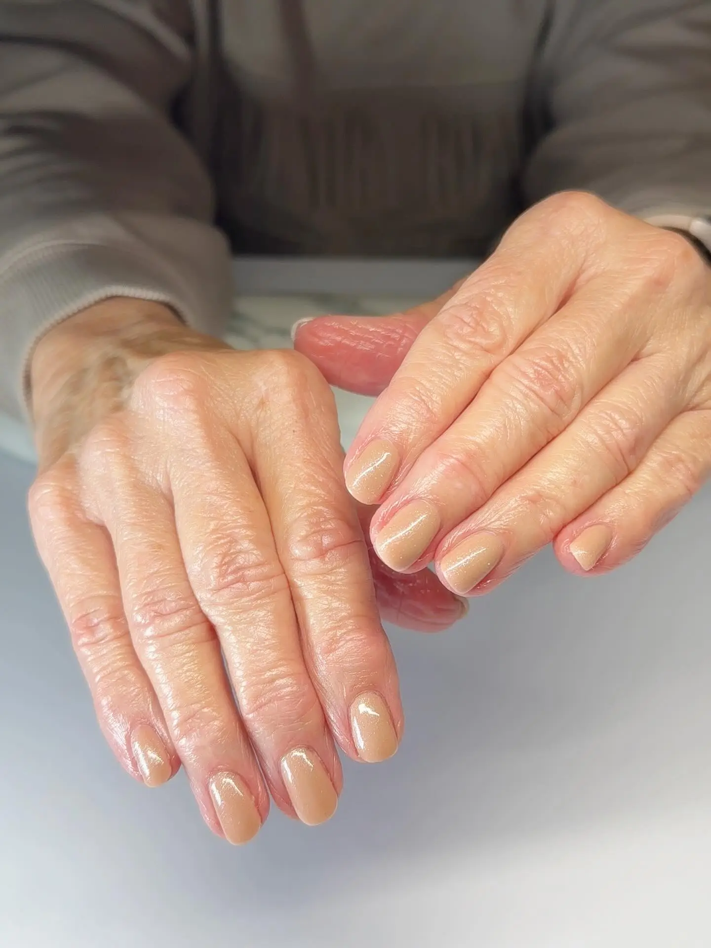 best nail colors for women over 50 — flattering shades mature hands 2026