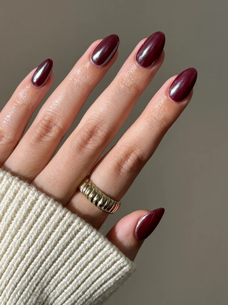 25 Stunning Almond Fall Nails Perfect for a Chic Autumn Vibe (2026) 10 almond fall nails 2026 burgundy chrome mirror nails