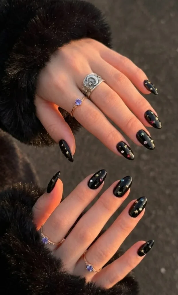 25 Stunning Almond Fall Nails Perfect for a Chic Autumn Vibe (2026) 26 almond fall nails 2026 black chrome constellation nail art