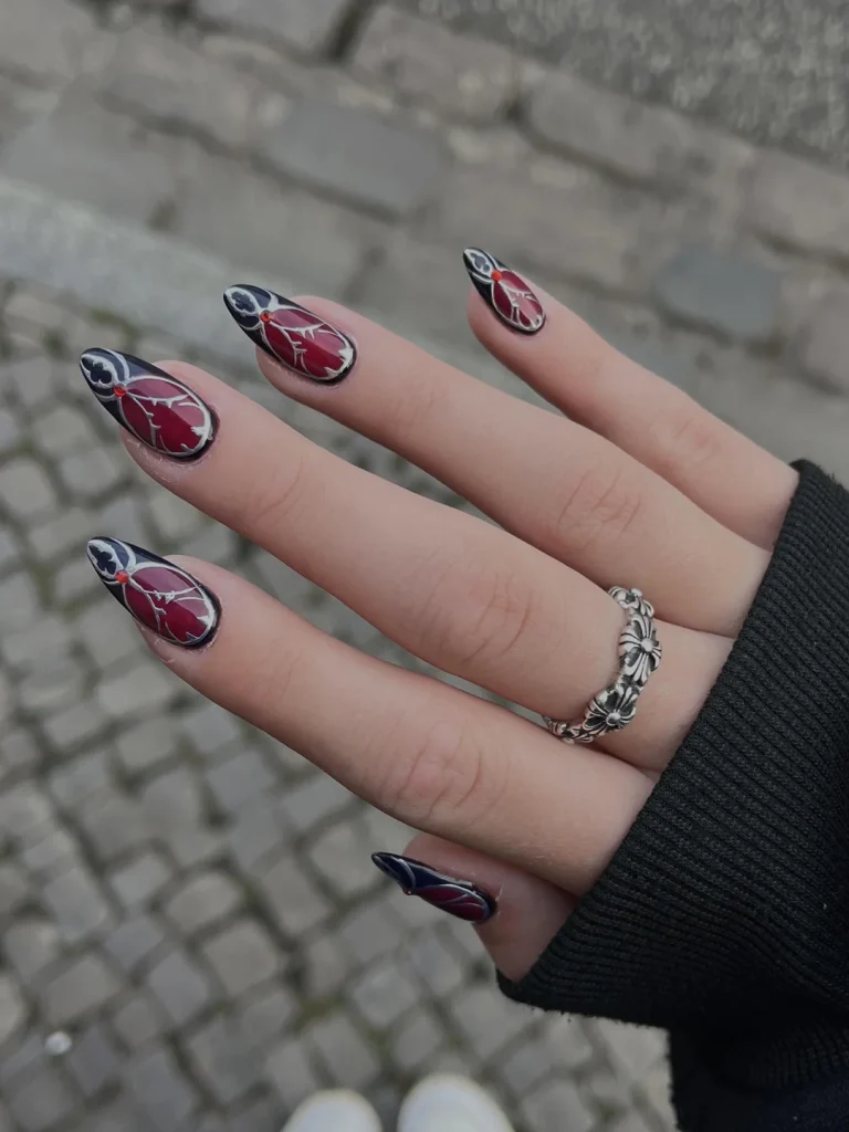 25 Stunning Almond Fall Nails Perfect for a Chic Autumn Vibe (2026) 15 almond fall nails 2026 gothic floral nail art oxblood