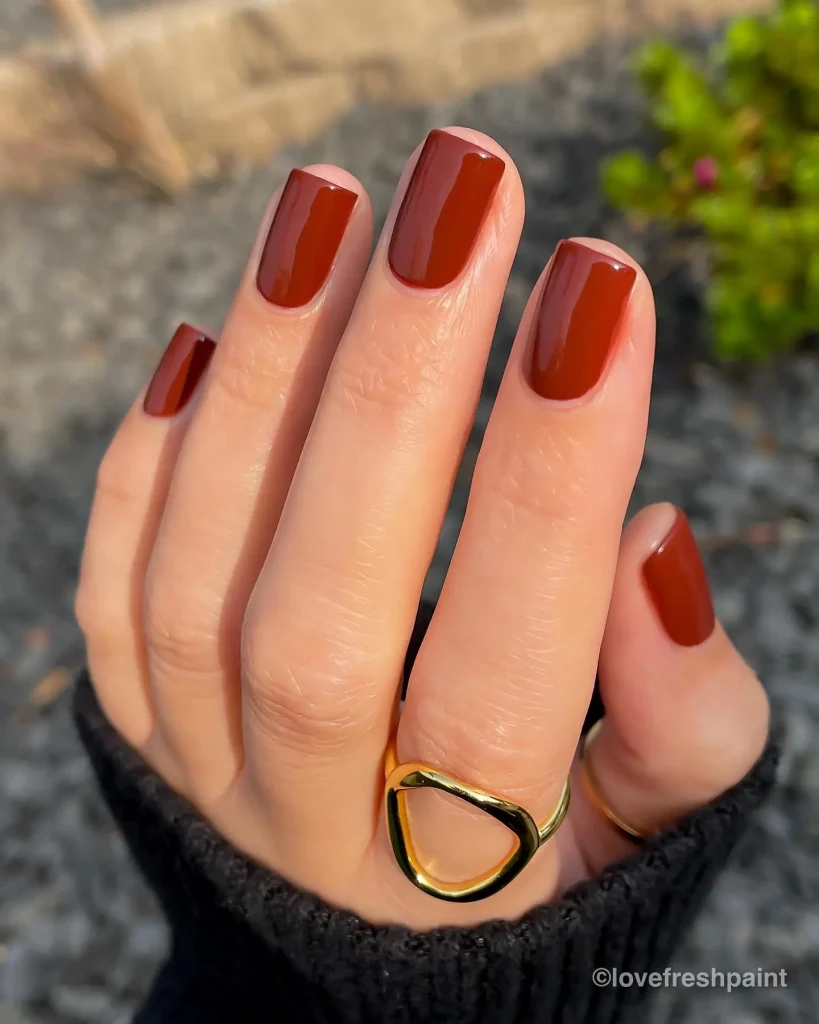 30 Trendy Short Fall Nails Perfect for a Classy Look 15 burnt sienna gloss short fall nails 2026 — bold warm earthy autumn manicure
