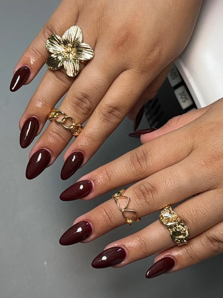 25 Stunning Almond Fall Nails Perfect for a Chic Autumn Vibe (2026) 2 almond fall nails 2026 spiced burgundy gloss